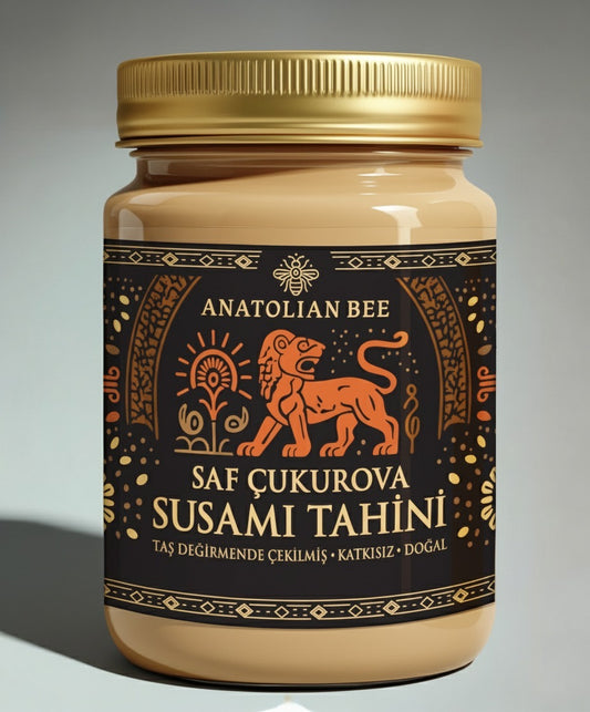 Anatolian Bee markasına ait Saf Çukurova Susamı Tahini – siyah ve altın desenli etikete sahip 350 g cam kavanoz, taş değirmende çekilmiş, katkısız ve doğal tahin